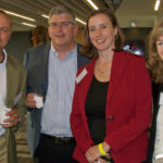 Todd Hutsko, Craig Stoll and Hellen Spanjer of Fleet Laboratories with Annie Walker, second from right, of Walmart