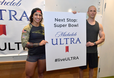 BOSTON, MA - FEBRUARY 02:  Boston Winners Ron Cooper and Danielle Resha at the Michelob ULTRA Pull-Up Challenge in Atlanta and Boston where fans have an oppportunity to win a trip to the Super Bowl on February 2, 2017 in Boston, Massachusetts.  (Photo by Paul Marotta/Getty Images for Michelob Ultra)